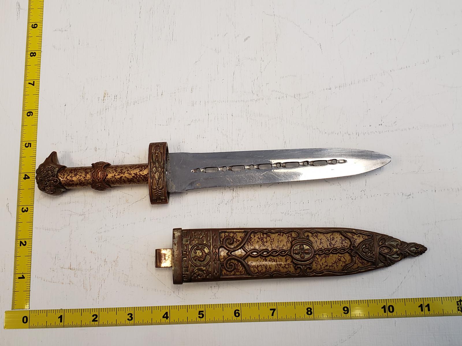 Small Brass dagger with decorative sheath - Not approved for blade to blade stage combat.