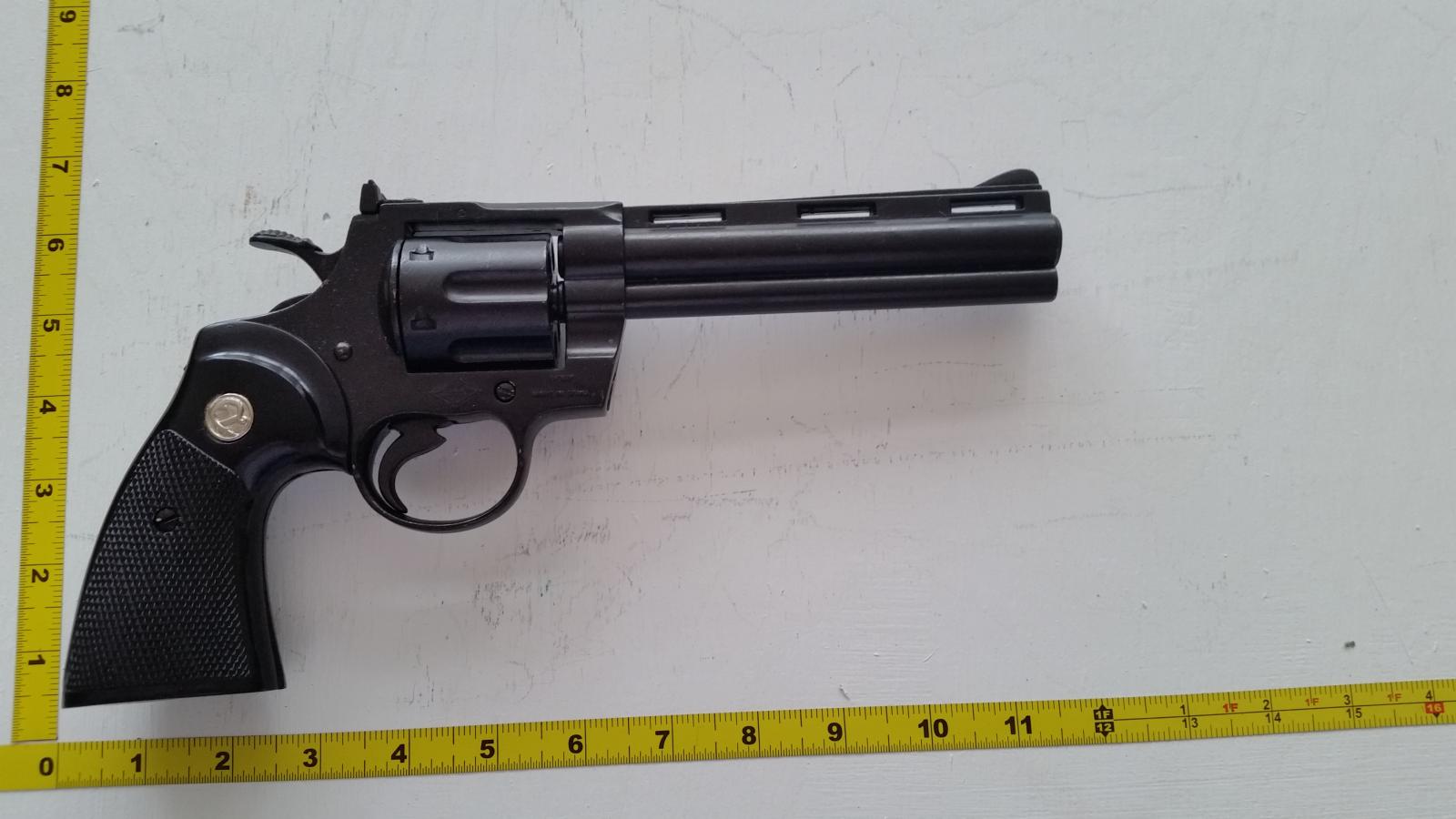 .357 6" Magnum Police Model Non-Firing Replica. Swing out 6 shot cylinder & working double action. Length: 11" Weight: 2.3 lbs