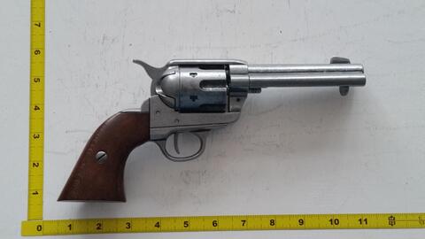 1873, Peacemaker .45 Caliber Single Action Revolver. Non-Firing Replica, Working Action, 4.75" Barrel. Overall Length: 10.5"  Weight: 2 lbs